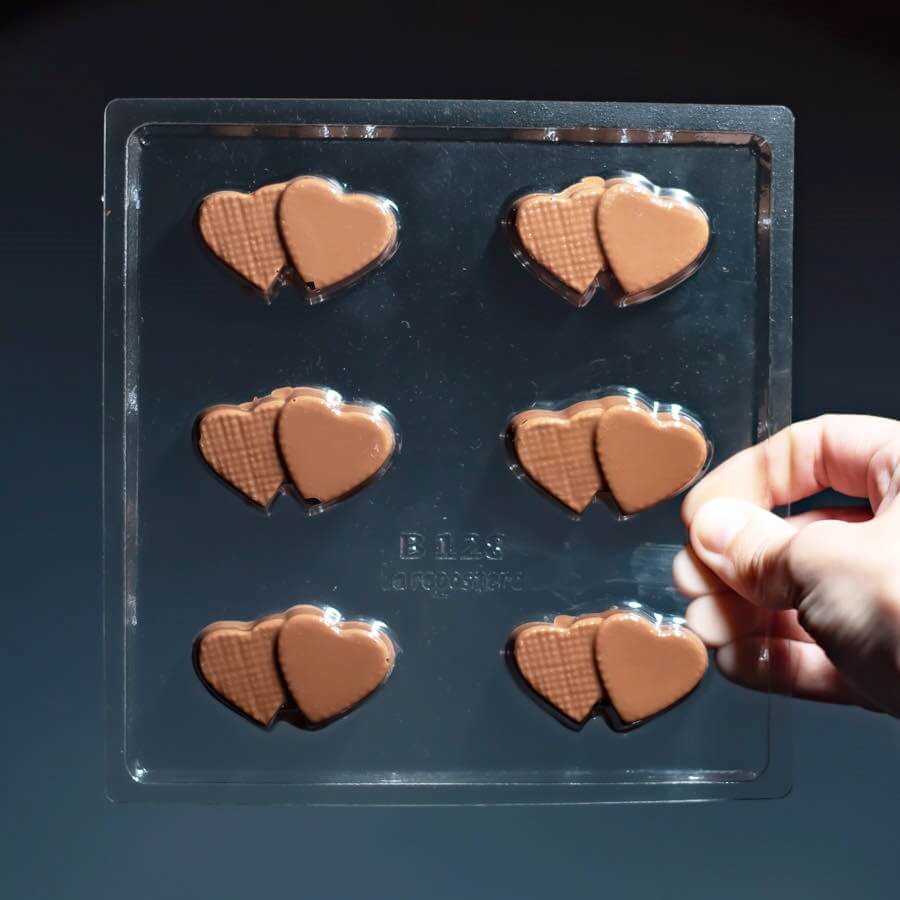 MOLDE PLACA BOMBON CORAZONES DOBLES B128